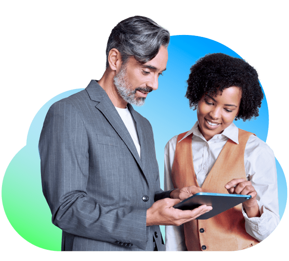 Man and woman collaborating on a tablet to showcase why Bullhorn's AI recruitment platform is the answer to what is the best ats software for 2026 for recruitment agencies.