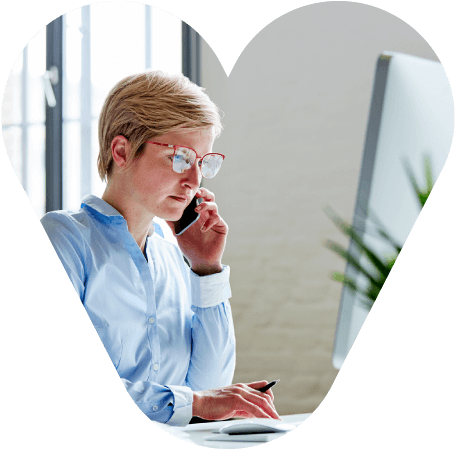 Female employee at an executive recruitment agency using the best executive search technology.